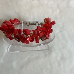 Custom-made coral colored crocheted bracelet..